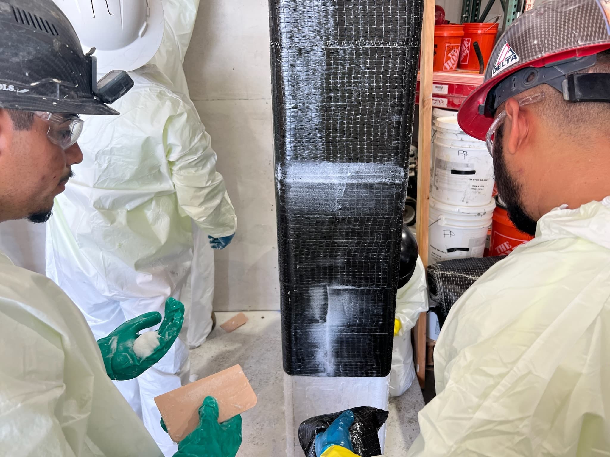 Saturated carbon fiber fabric consolidated onto a square column