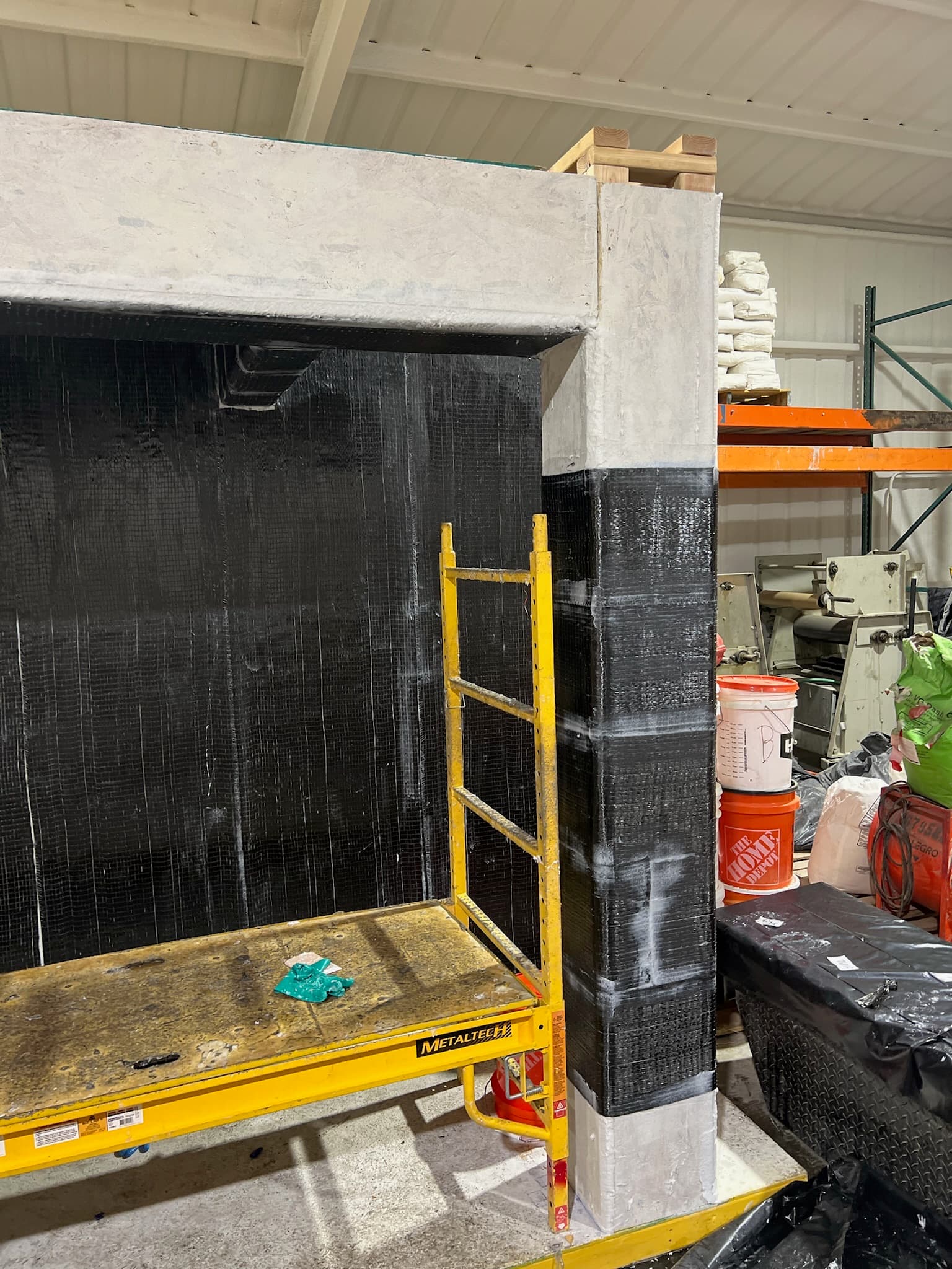 Finished FRP installation on the wall and column of the training mock-up